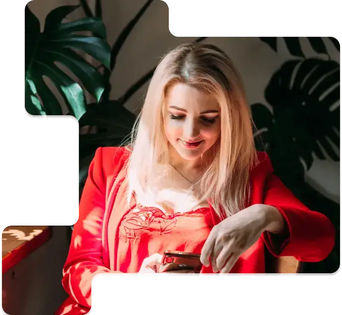 Woman streaming IPTV Services USA on mobile phone